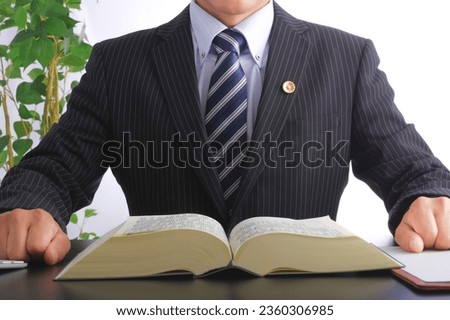 A dignified Japanese male lawyer Royalty-Free Stock Photo #2360306985