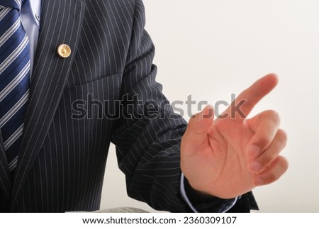 A male lawyer talking with gestures Royalty-Free Stock Photo #2360309107
