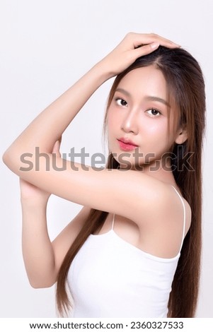 Studio shot of Beautiful young Asian woman with clean fresh skin on pink background, Face care, Facial treatment, Cosmetology, beauty and spa.
