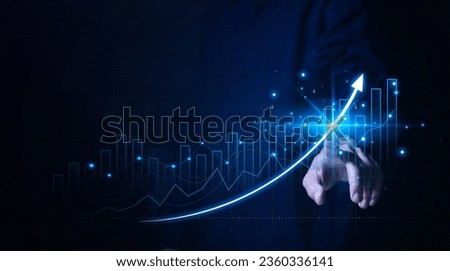 Businessman planning digital stock market analysis strategy showing positive technology chart powerful investment ideas exchange rate economy development stock growth and business success goals Royalty-Free Stock Photo #2360336141