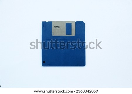 Blue diskette isolated on white background SHOTLIST1990 Royalty-Free Stock Photo #2360342059
