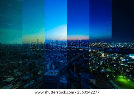 A sliced time lapse photography of panorama cityscape near Yodo river in Osaka wide
