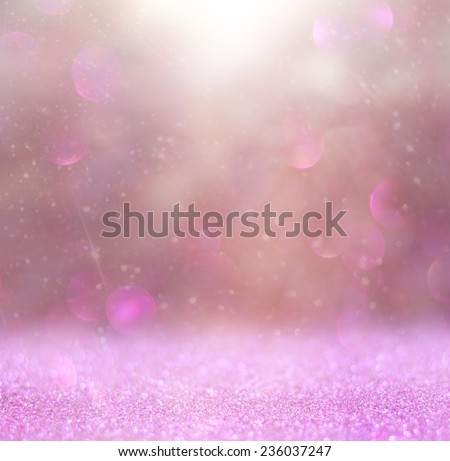 blurred abstract pink and purple  bokeh lights and texture. image is defocused