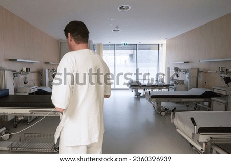 hospital nurse in health care, working as a medical professional  Royalty-Free Stock Photo #2360396939