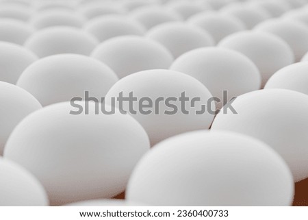 Many white eggs on saddle brown background. Closeup view, macro shot, selective focusclose up shot