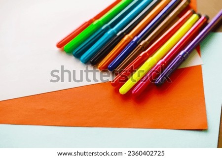 Colorful Wooden Crayons and flomasters on white background stock photo