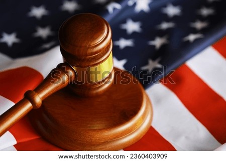 Judge's gavel on the table in focus. Cropped view of Judge's hammer for attention and verdict, justice judgment at courts. Royalty-Free Stock Photo #2360403909