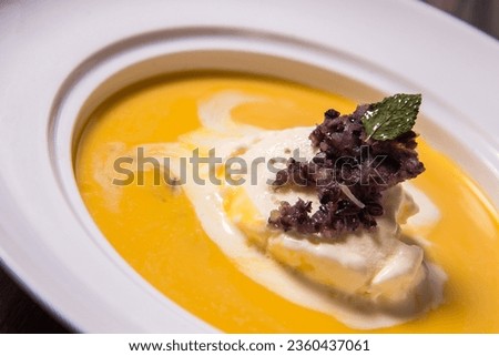 premium chilled cold mango fruit sago creamy sweet soup with vanilla ice cream coconut milk in plate on wood table asian halal food restaurant banquet dessert cafe menu