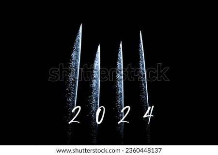 Happy new year 2024 blue fireworks rockets new years eve. Luxury firework event sky show turn of the year celebration. Holidays season party time. Premium entertainment nightlife background