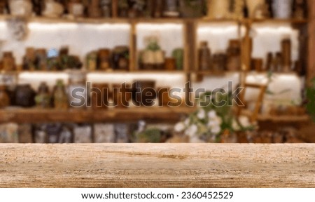 Wooden Table with Abstract Blurred Pharmacy View. Ideal for product presentations or mockups.