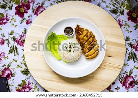 Grilled Chicken Breast with Rice On The Table, Backgrounds for advertisements and wallpapers in food and cooking scenes. Actual images in decorating ideas.