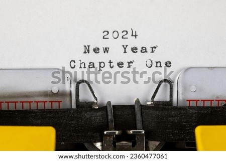 Old typewriter with text 2024 New Year Chapter One Royalty-Free Stock Photo #2360477061