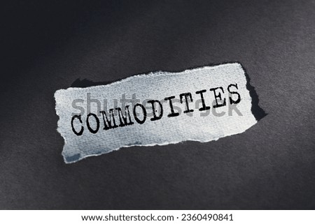 COMMODITIES - word on sheet of torn paper. Business concept, buying, selling, paying for services. Royalty-Free Stock Photo #2360490841