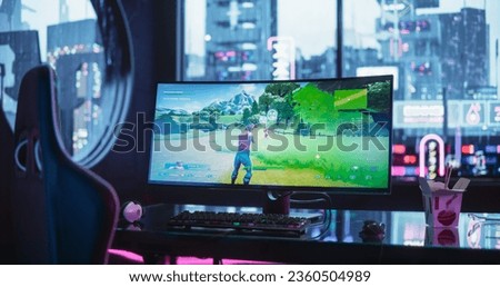 Empty Futuristic Cyberpunk Room with Neon Lights with a Professional Gaming Station. Ultra Wide Curved Monitor with Shooter Video Game Standing on a Stylish Glass Table Royalty-Free Stock Photo #2360504989