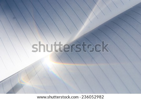 sunlight on a open notebook