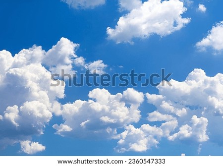 this is a beautiful Cloud. Abstract white cloudy set isolated on blue background.  Royalty-Free Stock Photo #2360547333