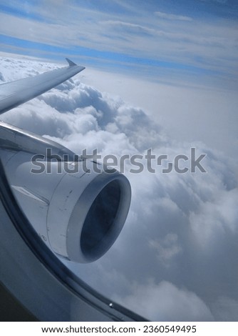 
view of the sky from inside the plane