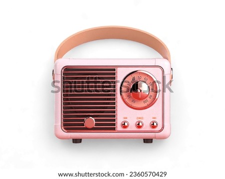 Miniature pink radio on a white background