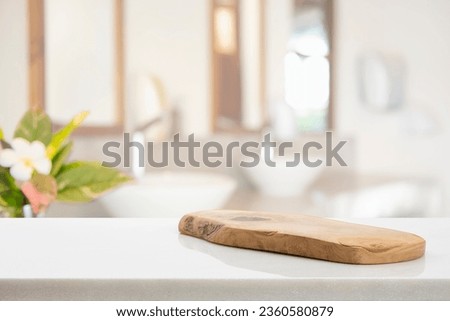 Wooden pedestal on table in bathroom interior and free space