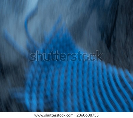 deep blue abstract background with blurred waves and net