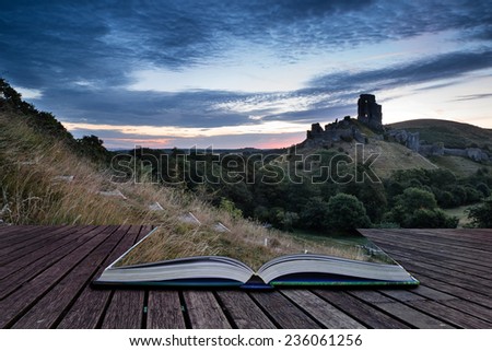 Stunning sunrise landscape over ruins of medieval castle conceptual book image