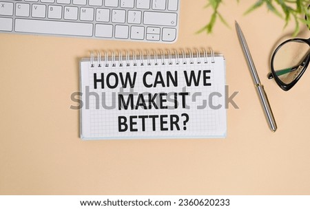 Text sign showing How Can We Make It Better question. Conceptual photo asking how increase quality of product Man holding marker notebook clothespin reminder yellow table and keyboard.