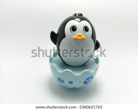 Black and white penguin character children's toy