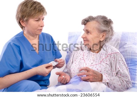 Senior woman takes the medicine