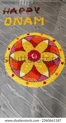 flower design for onam with yellow red flowers