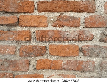 cracked cement brick block surface as background for design