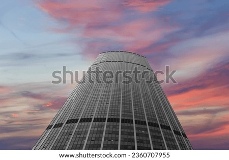 Skyscrapers La Defense (against the background of a sky at sunset), commercial and business center of Paris, France 