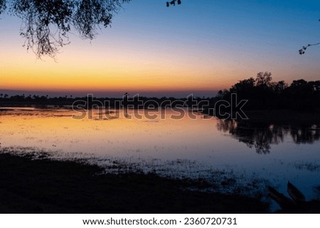 African Sunset in Okavango Delta or Okavango Grassland, Botswana