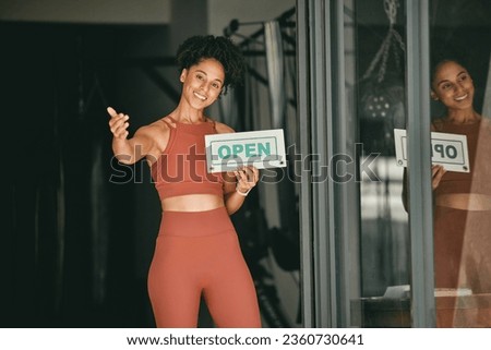 Black woman, welcome and gym owner with open sign for fitness or coaching exercise. Portrait of African American female, sports entrepreneur and training manager or personal trainer at entrance Royalty-Free Stock Photo #2360730641