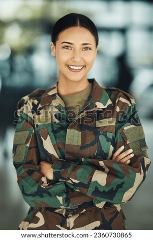 Portrait, military and woman with arms crossed, smile and war with protection, confident and power. Person, security and lady warrior proud, hero and ready for army, service or training for combat Royalty-Free Stock Photo #2360730865
