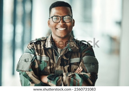 Portrait of soldier with smile, confidence and pride at army building, arms crossed and happy professional. Military career, security and courage, black man in camouflage uniform at government agency