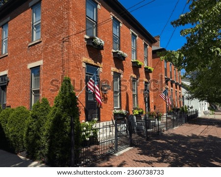Old residential buildings along brick sidewalks maintain an old world charm in German Village, a uniquely preserved neighborhood of Columbus, Ohio