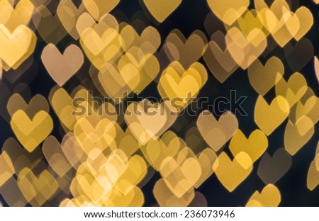 Golden color hearts background 