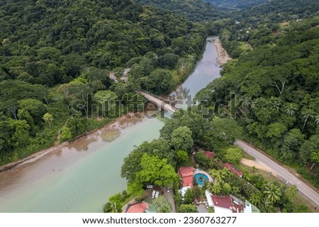 Beautiful aerial view of Dominical Beach and The Baru River in Costa Rica