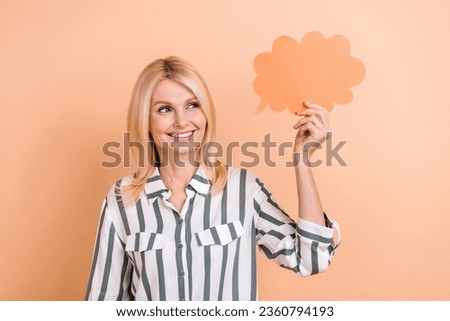 Portrait of thoughtful minded woman bob hairdo wear striped formalwear look at mind cloud empty space isolated on beige color background