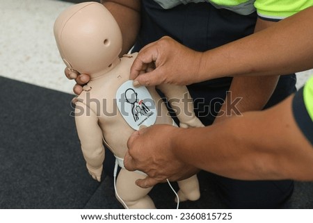 CPR training AED Training first aid ปั๊มหัวใจช่วยชีวิต เจ็บป่วยฉุกเฉิน Royalty-Free Stock Photo #2360815725