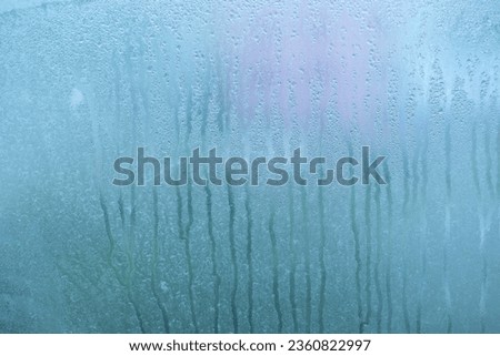 Misted window glass. Texture. Background.