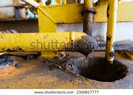 Sewer pipes and liquid sludge remaining from the pipe system.