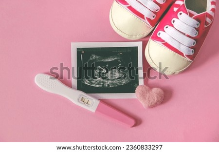Ultrasound picture of a baby's photograph and accessories. Selective focus. child.