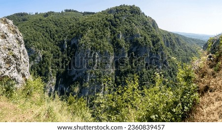 Panoramic view of the Oltet gorge from Outlaw Surah, Baia de Fier, Gorj, Romania Royalty-Free Stock Photo #2360839457