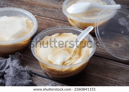 Tofu Fa or soya pudding mix with brown sugar syrup Royalty-Free Stock Photo #2360841151