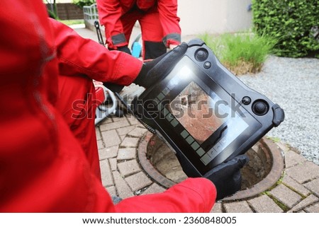 Sewer inspection with camera, close up Royalty-Free Stock Photo #2360848005