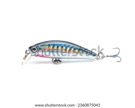 Picture of colorful fish shaped plug baits with 3 way hooks. Fishing equipment isolated on white background. Royalty-Free Stock Photo #2360875043