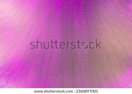 Elegant natural purple background with white speckles and dark stripes. Macro photo of a flower petal