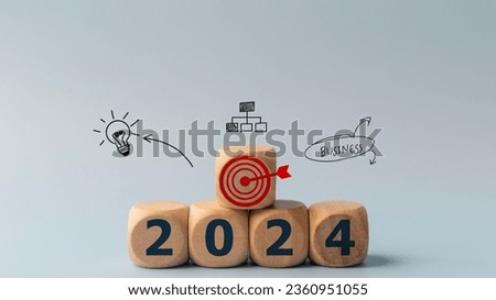 2024 goals of business or life. Wooden cubes with 2024 and goal icon on smart background. Starting to new year. Business common goals for planning new project, annual plan, business target achievement Royalty-Free Stock Photo #2360951055