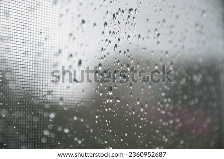rain drop background. raindrop in autumn weather. rainy water surface on glass. wet rain drop background. droplet on window or condensation. clear reflection.